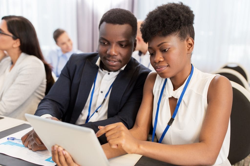 enyan digital marketing agency professional analyzing strategic growth metrics and social media performance on a tablet.